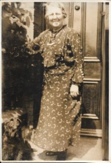 Isabella Wood at her front door in Seventh Avenue, still tending plants